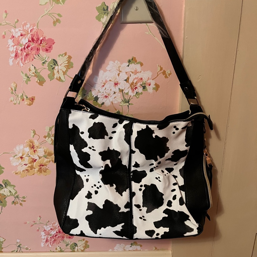 Faux leather Cow print shoulder bag. NWOT